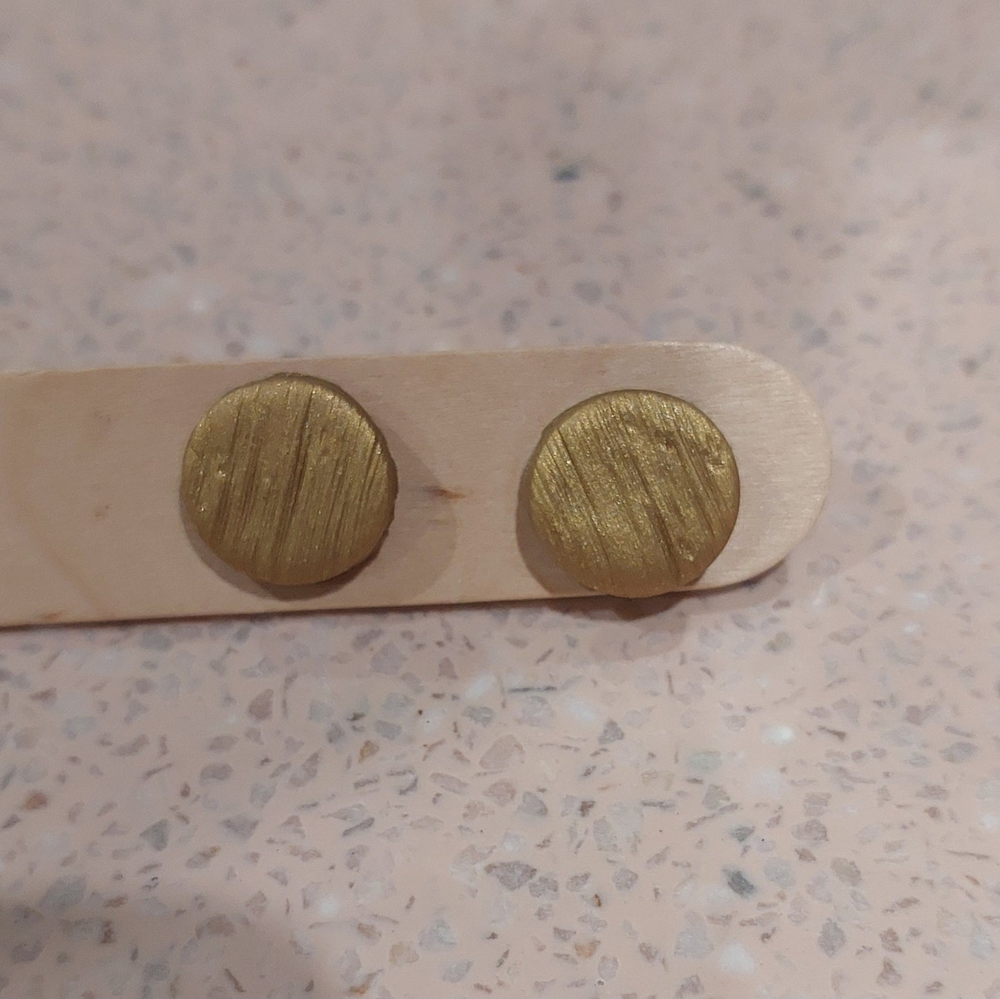 Brushed texture studs