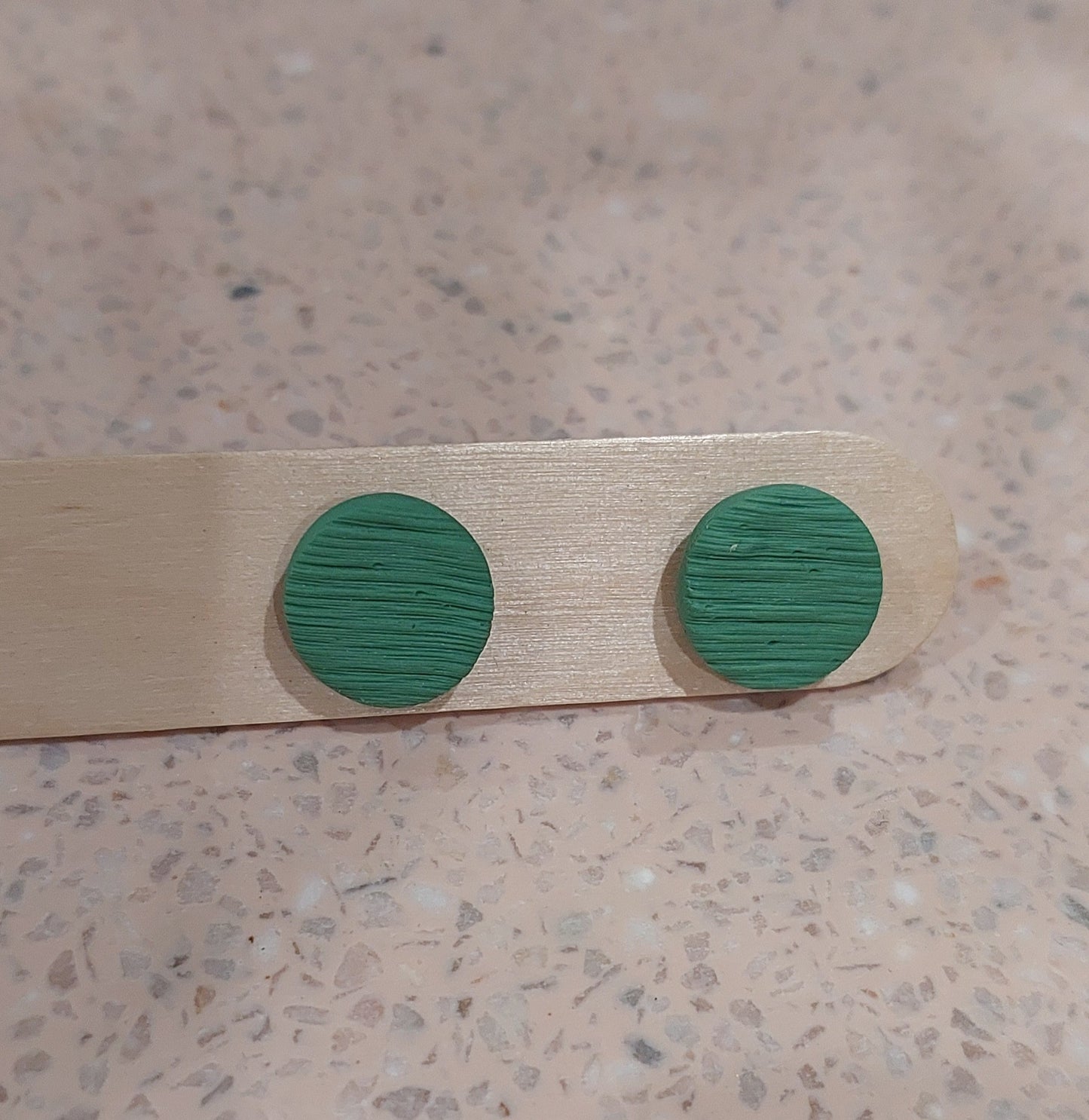 Brushed texture studs