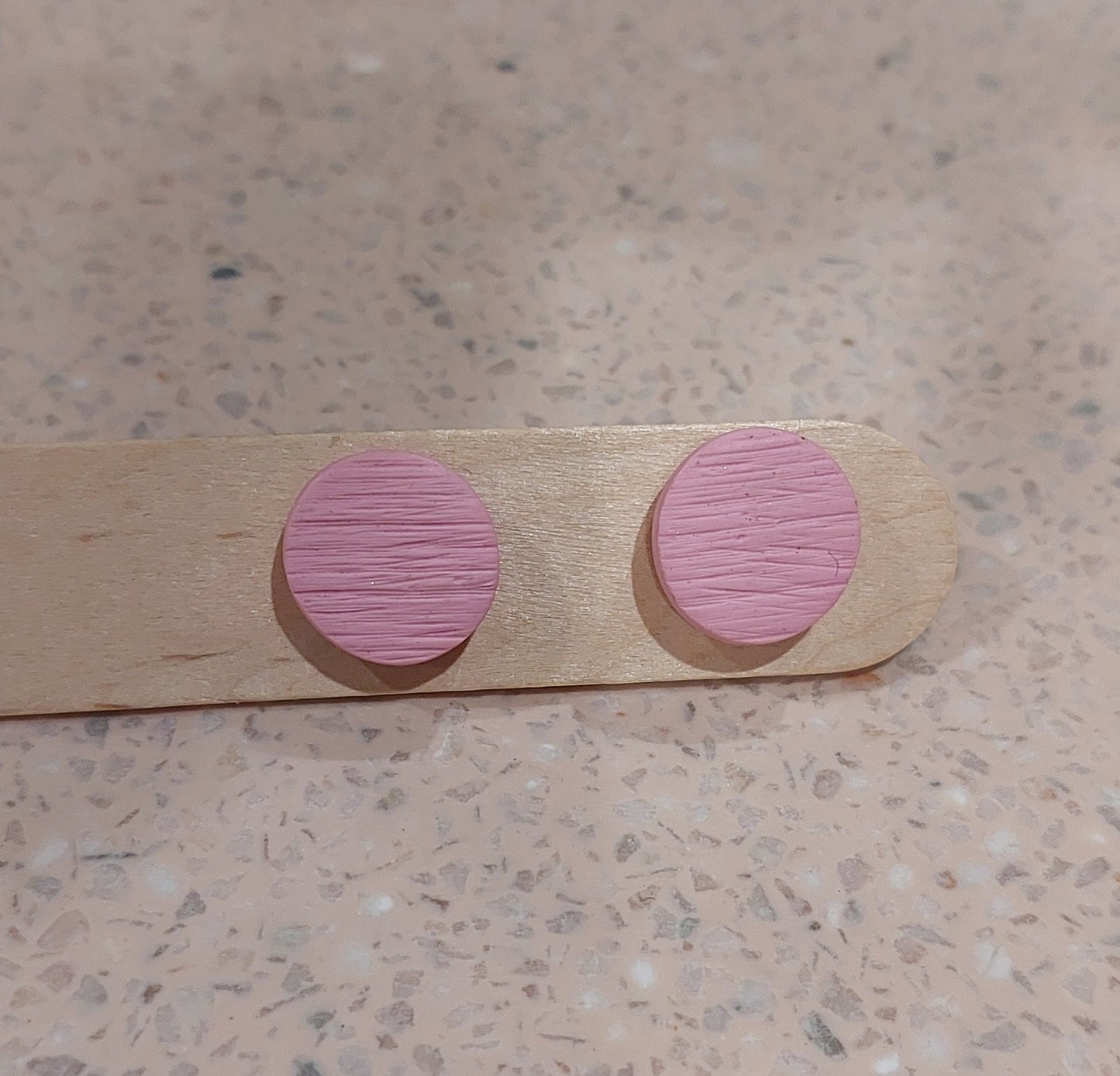 Brushed texture studs