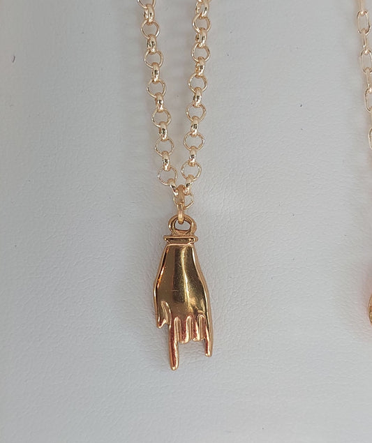 Golden hand necklace